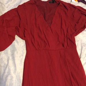 Red long sleeve dress with a high slit